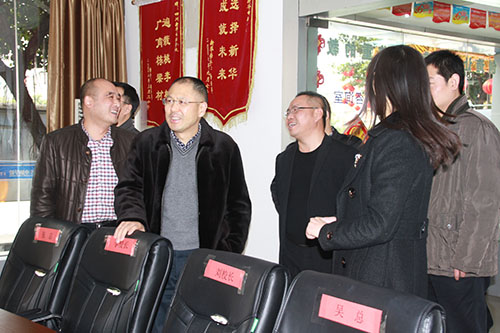 新华集团领导莅临我校视察指导工作